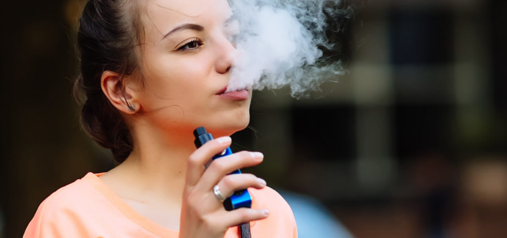 woman learns about vaping and oral health