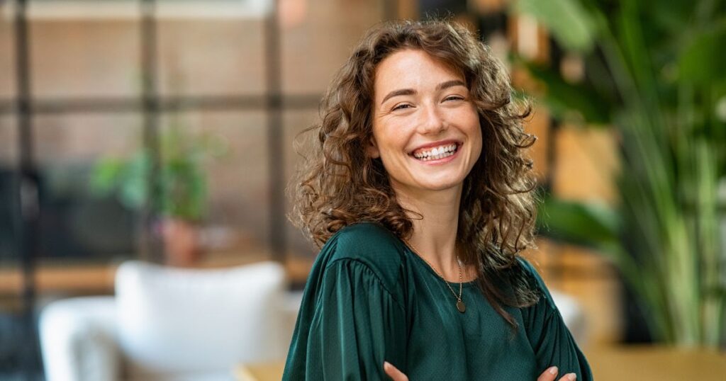adult smiles after using oral probiotics